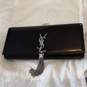 Yves Saint Laurent Black Clutch with Silver Tassel